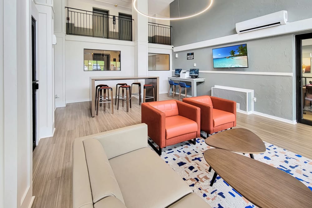 Lounge area with working stations at Solon Club Apartments in Oakwood Village, Ohio