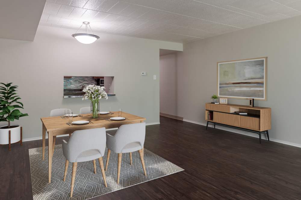 Dining area with vinyl plank flooring at The Cascades Townhomes and Apartments in Pittsburgh, Pennsylvania