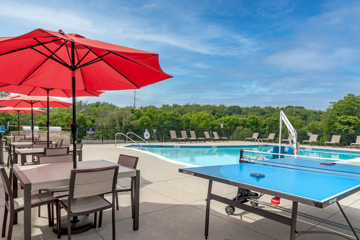 Swimming pool with table tennis board and picnic table at The Kane in Aliquippa, Pennsylvania