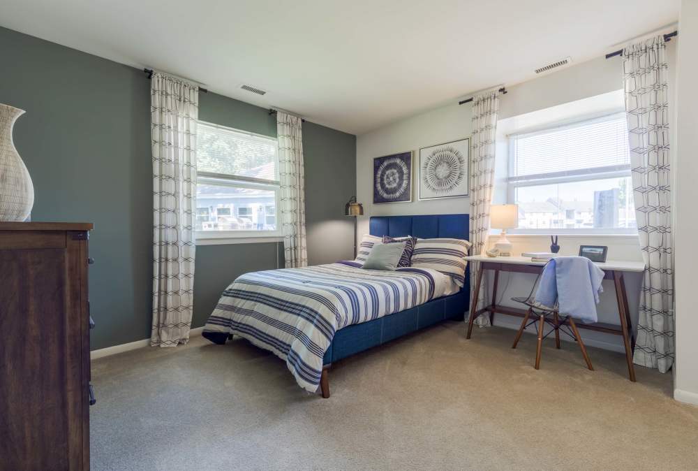 Relaxing bedroom at The Landings Apartment Homes in Absecon, New Jersey