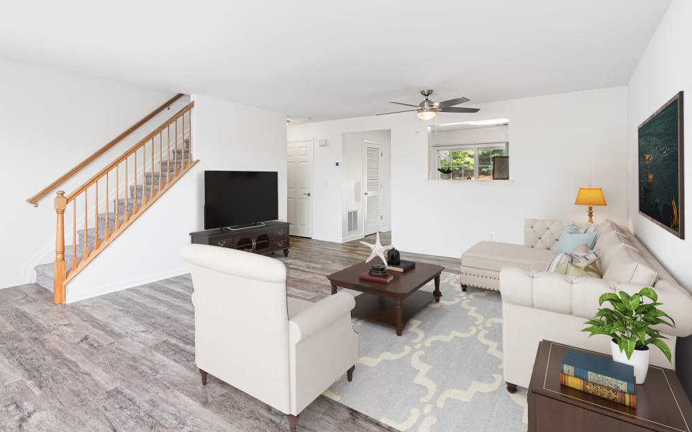 Spacious, modern living room at Mews at Annandale Townhomes in Annandale, New Jersey