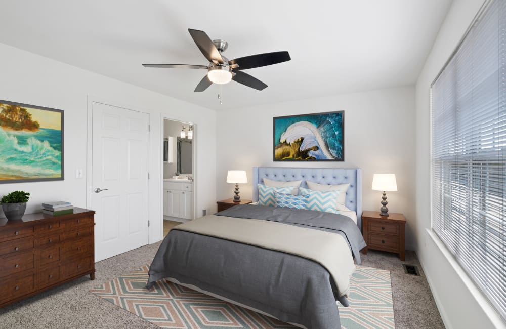 Spacious living room with ceiling fan at Mews at Annandale Townhomes in Annandale, New Jersey
