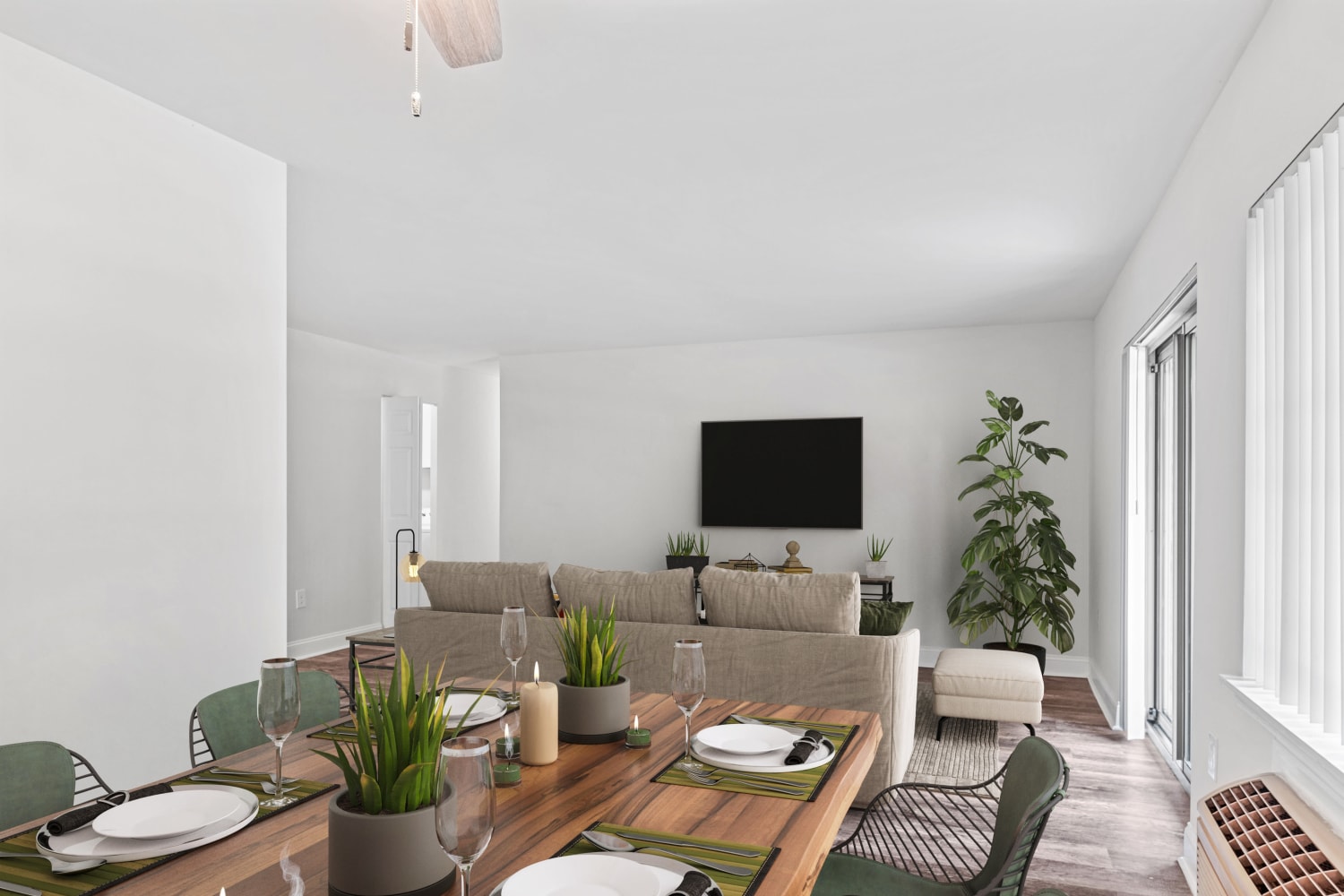 Cozy living space next to dining area at Timberlake Apartment Homes in East Norriton, Pennsylvania