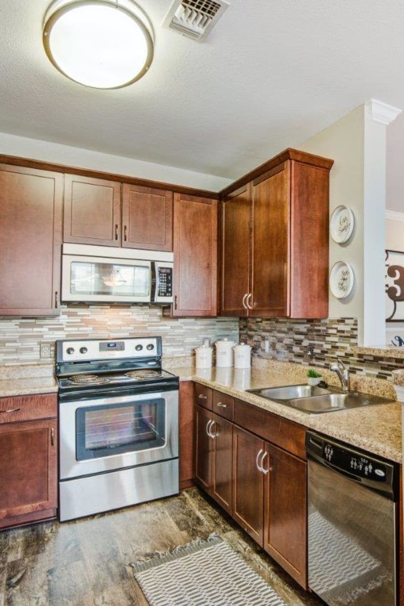 Kitchen Village at Potomac Falls Apartment Homes on a sunny spring day in Sterling, Virginia