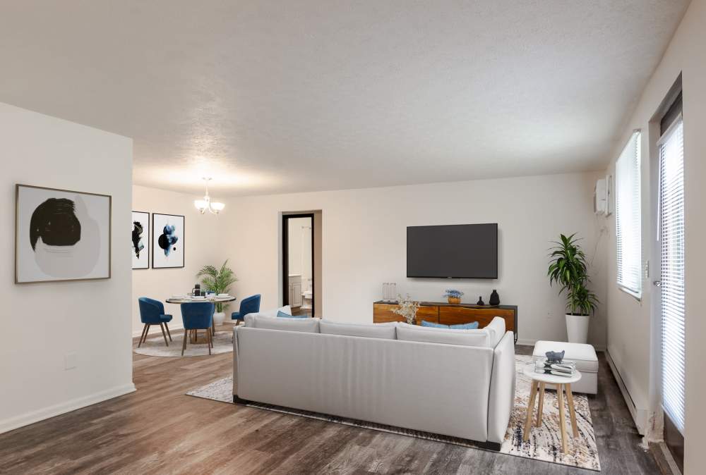 Living Room with Decorative Painting on the Wall at Westpointe Apartments in Pittsburgh, Pennsylvania