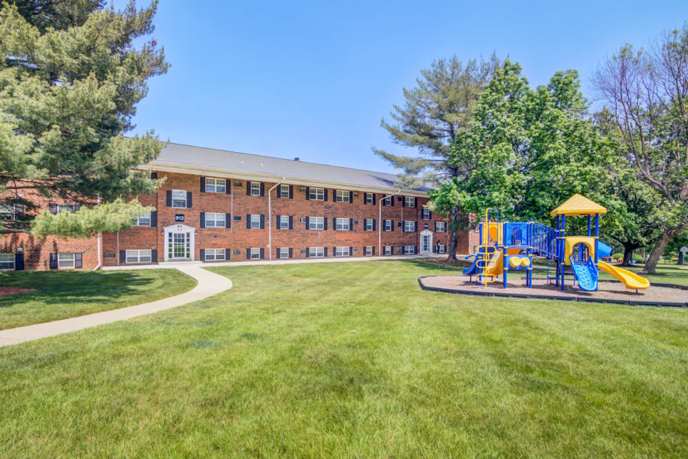 Large grassy area with playground