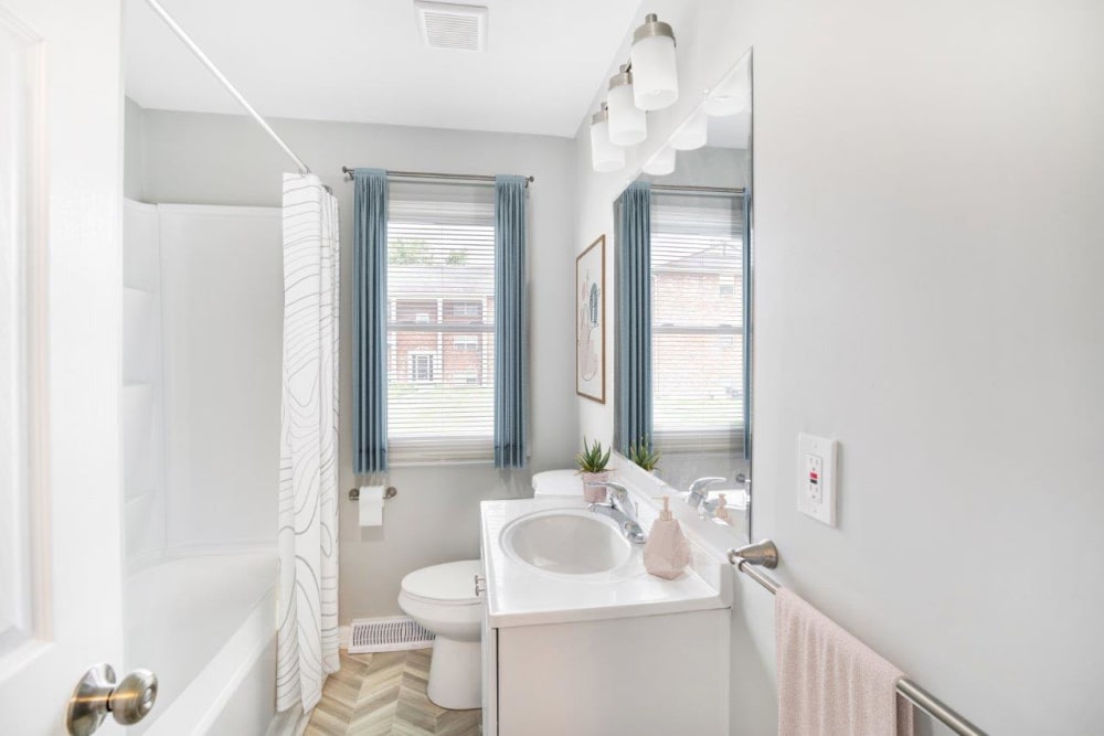 Full bath in model apartment at Woodcrest Apartment Homes in Dover, Delaware
