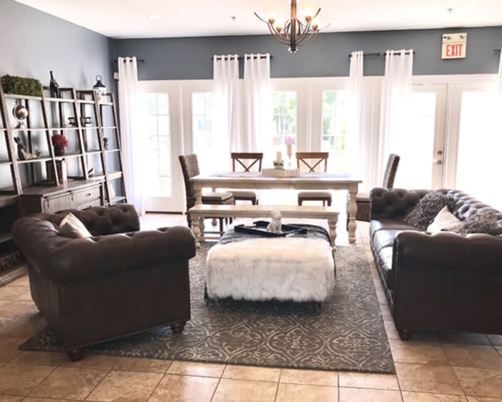 A living room in an apartment at Woodview at Marlton Apartment Homes in Marlton, New Jersey