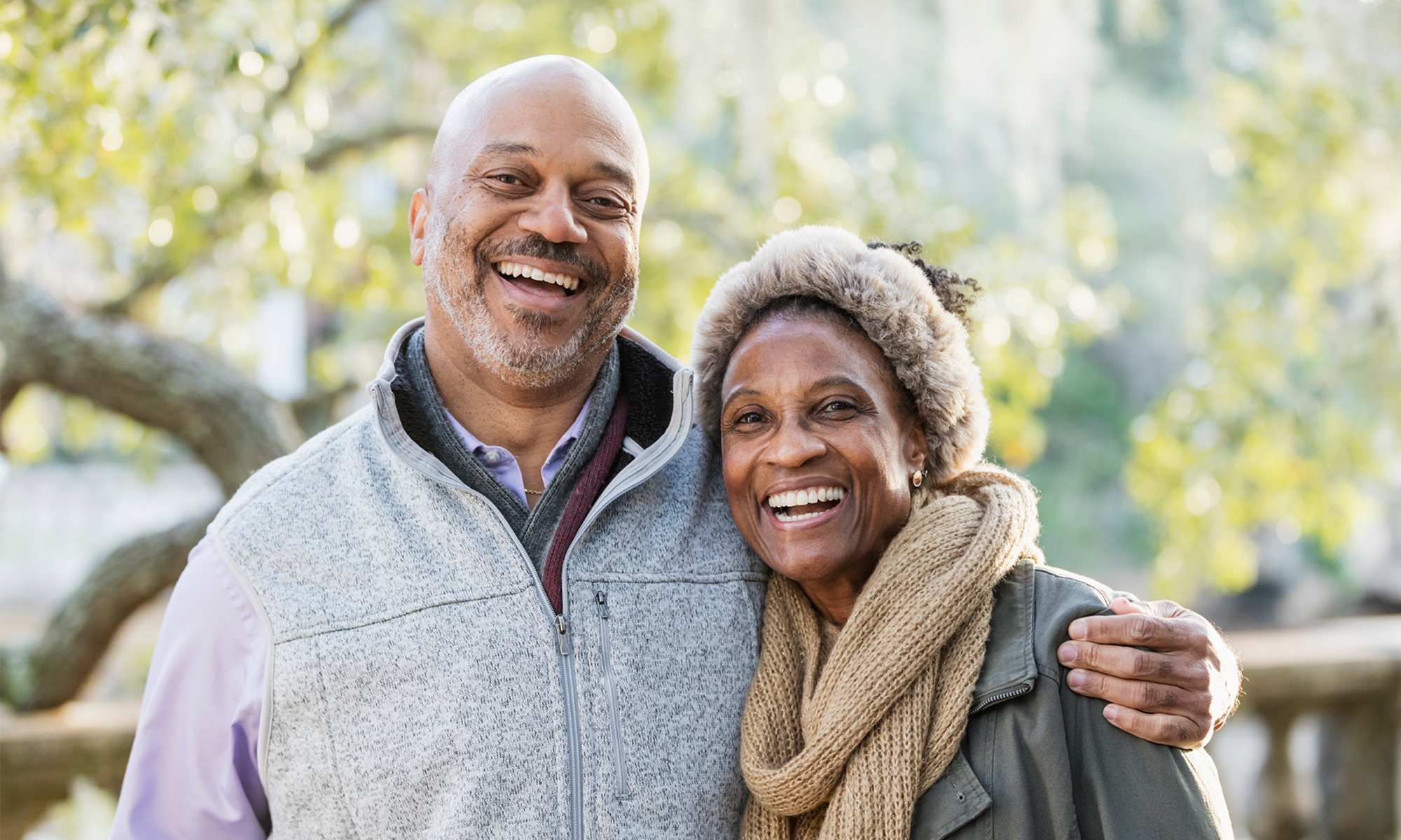 Smiling residents outside of Mews at Annandale Townhomes in Annandale, New Jersey